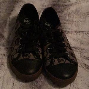 Pair of Micheal Kors tennis shoes